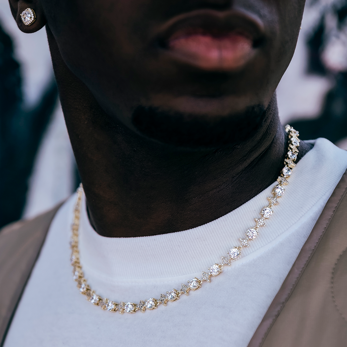 Round Stone Star Tennis Chain in Yellow Gold